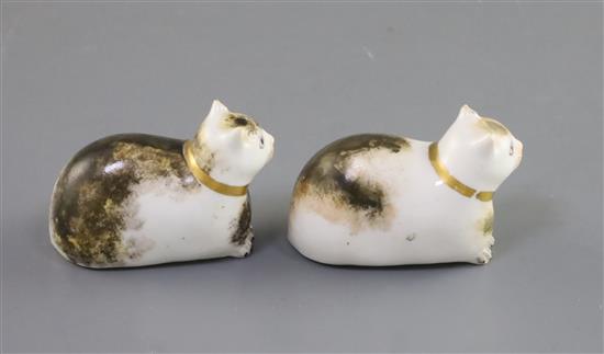 Two Derby porcelain figures of recumbent cats, c.1830, L. 6.2cm, small ear chips